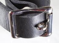 A locking true roller center bar buckle in use.